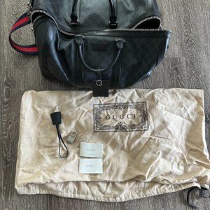 GUCCI GG-logo coated-canvas duffel bag